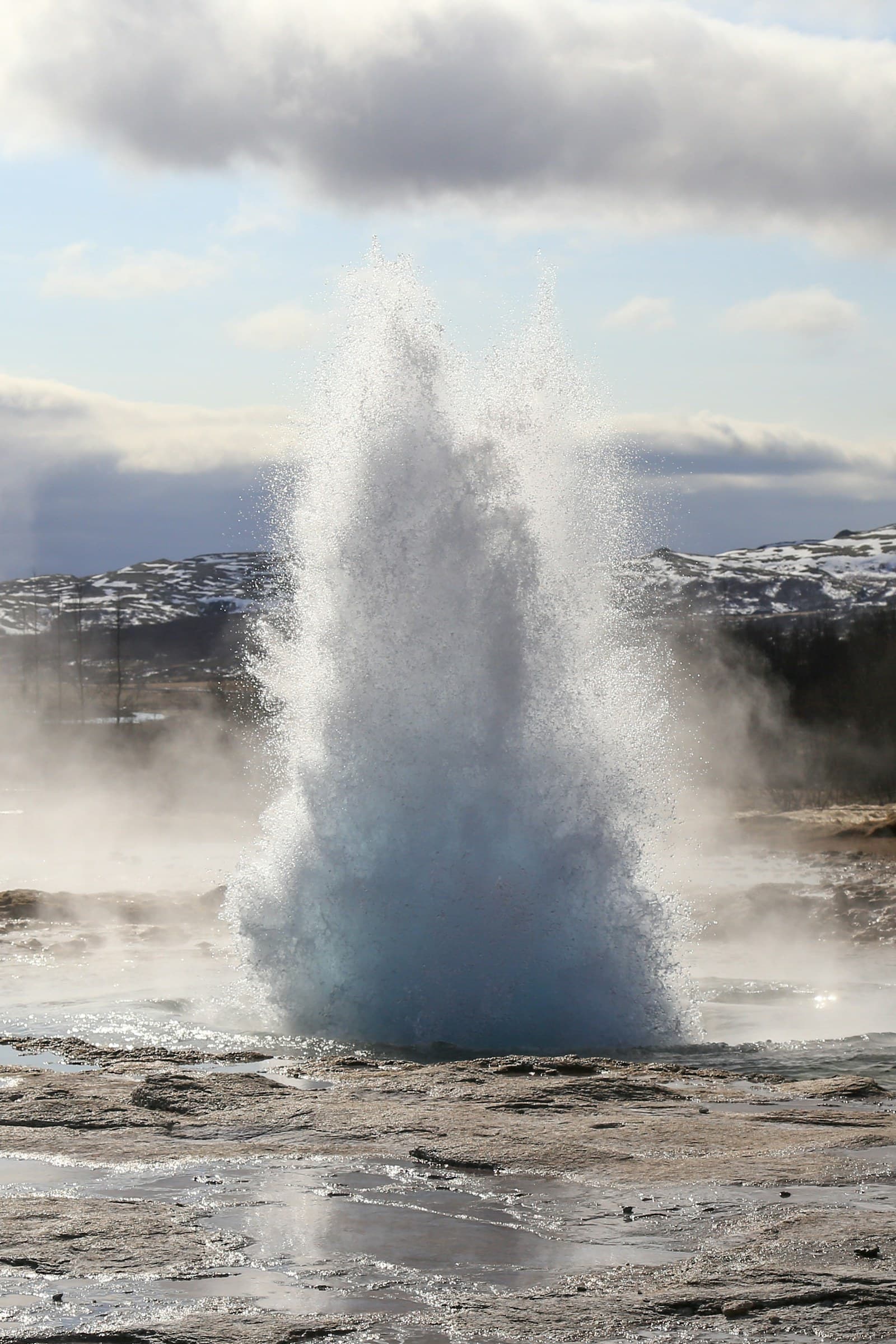 Steam rising from an Icelandic geothermal hot spring