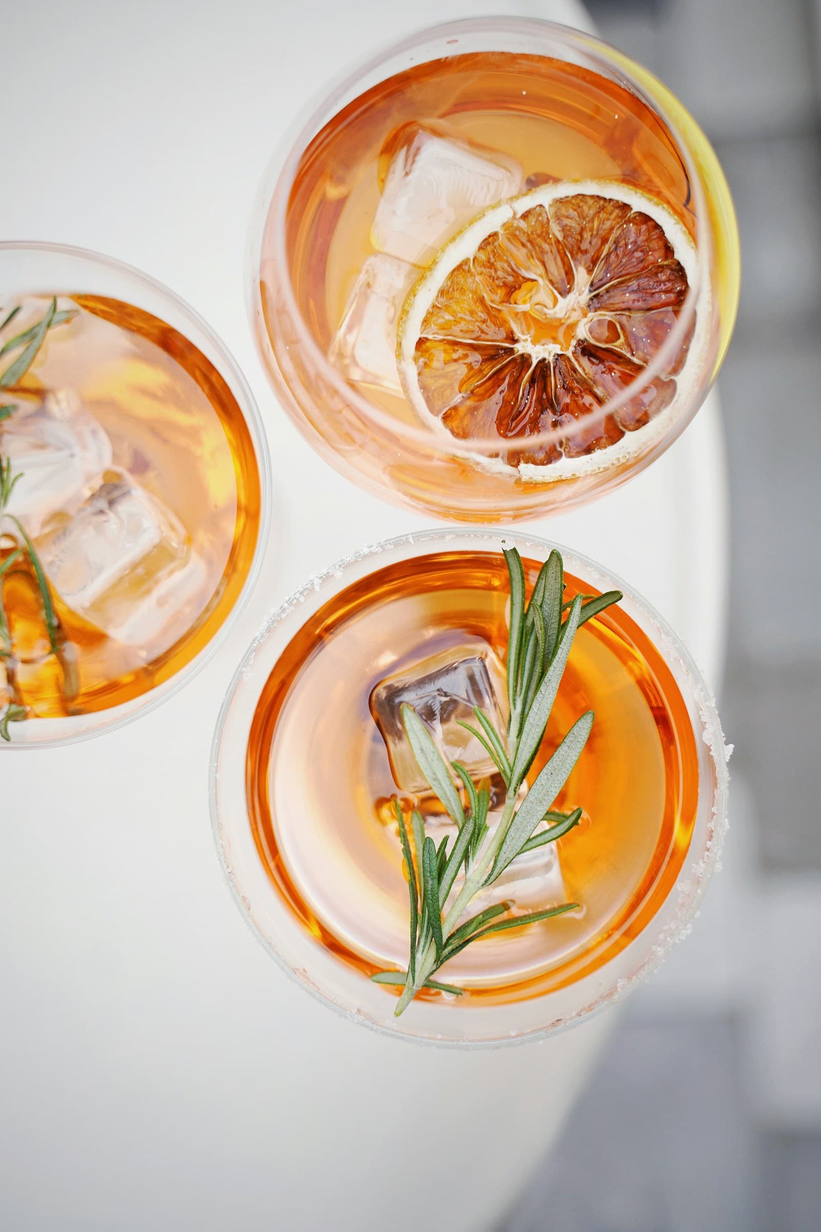 Aperol Spritz cocktails on a wooden table