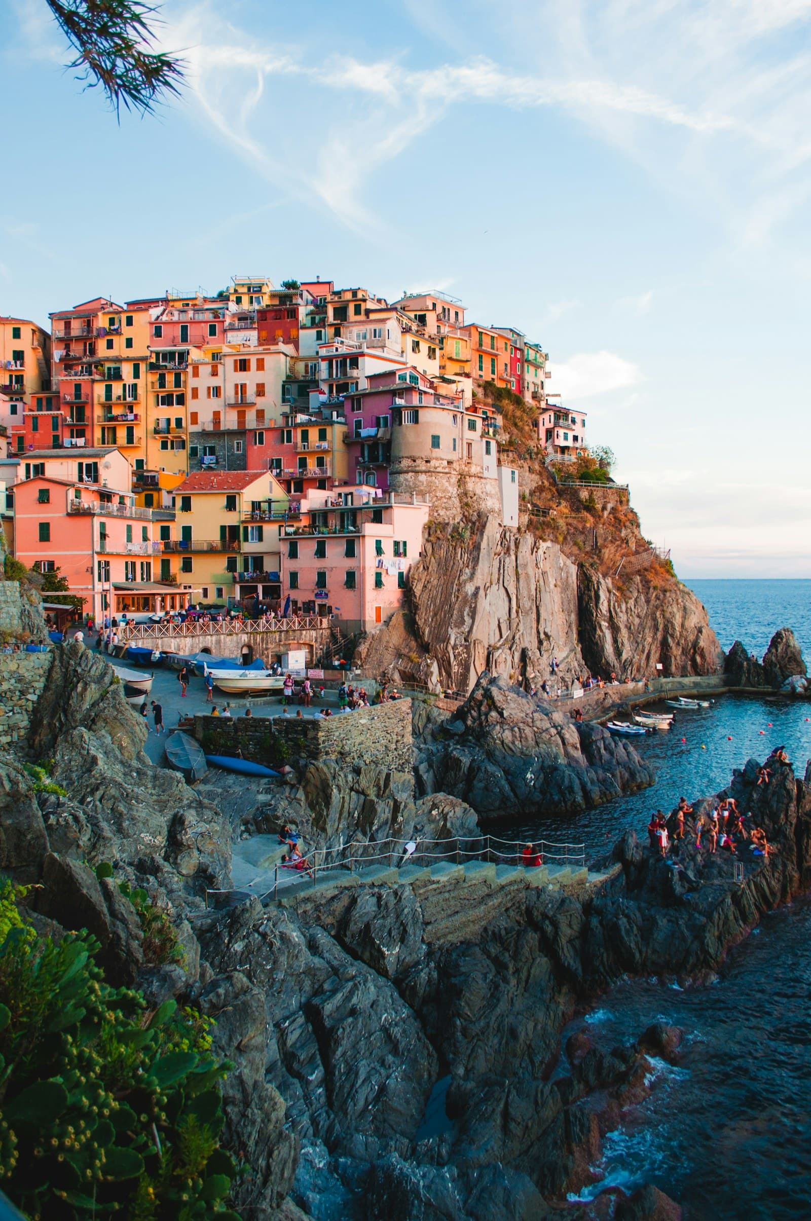 Colorful houses of a Cinque Terre village on a cliff above the sea