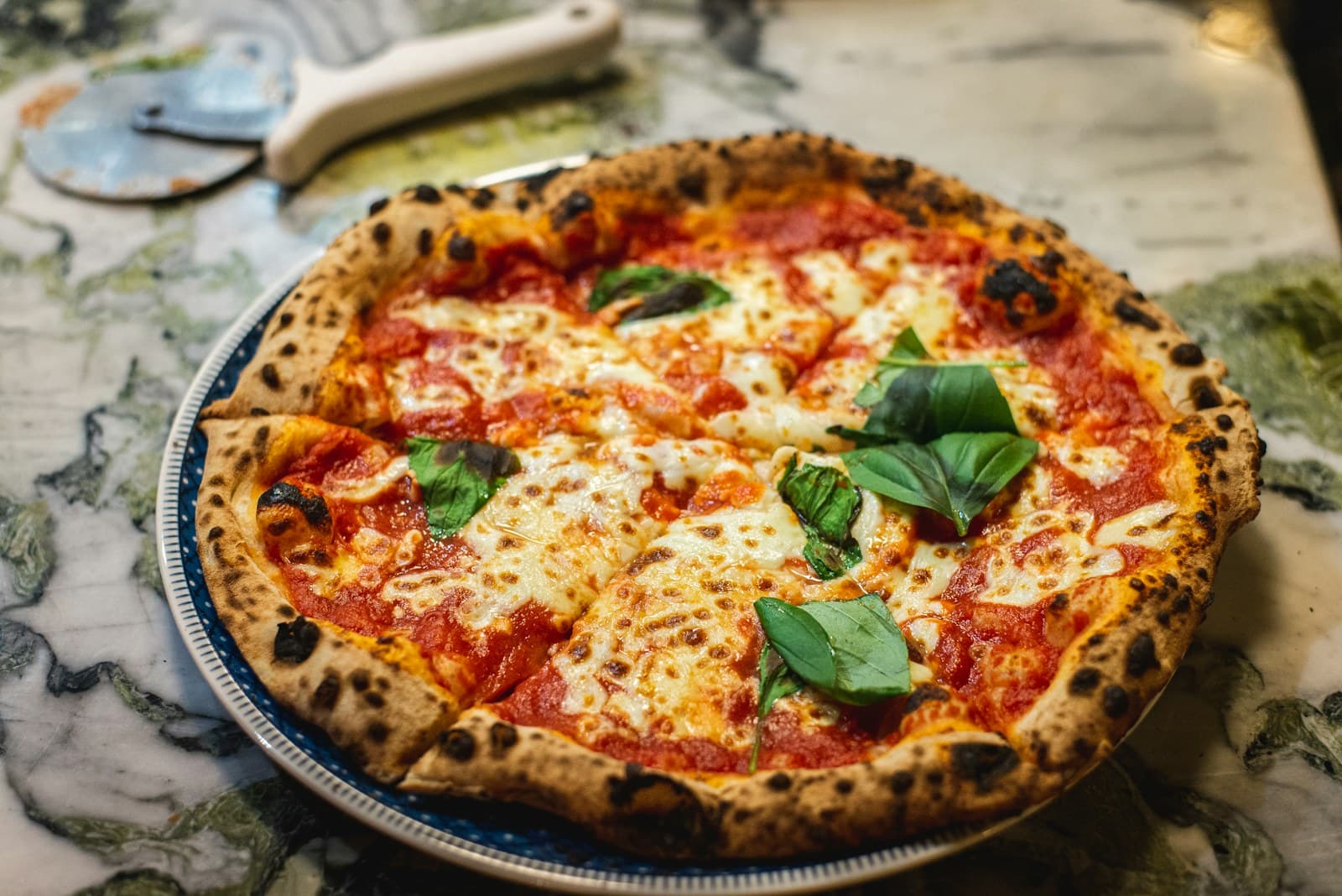 Neapolitan margherita pizza with blistered crust