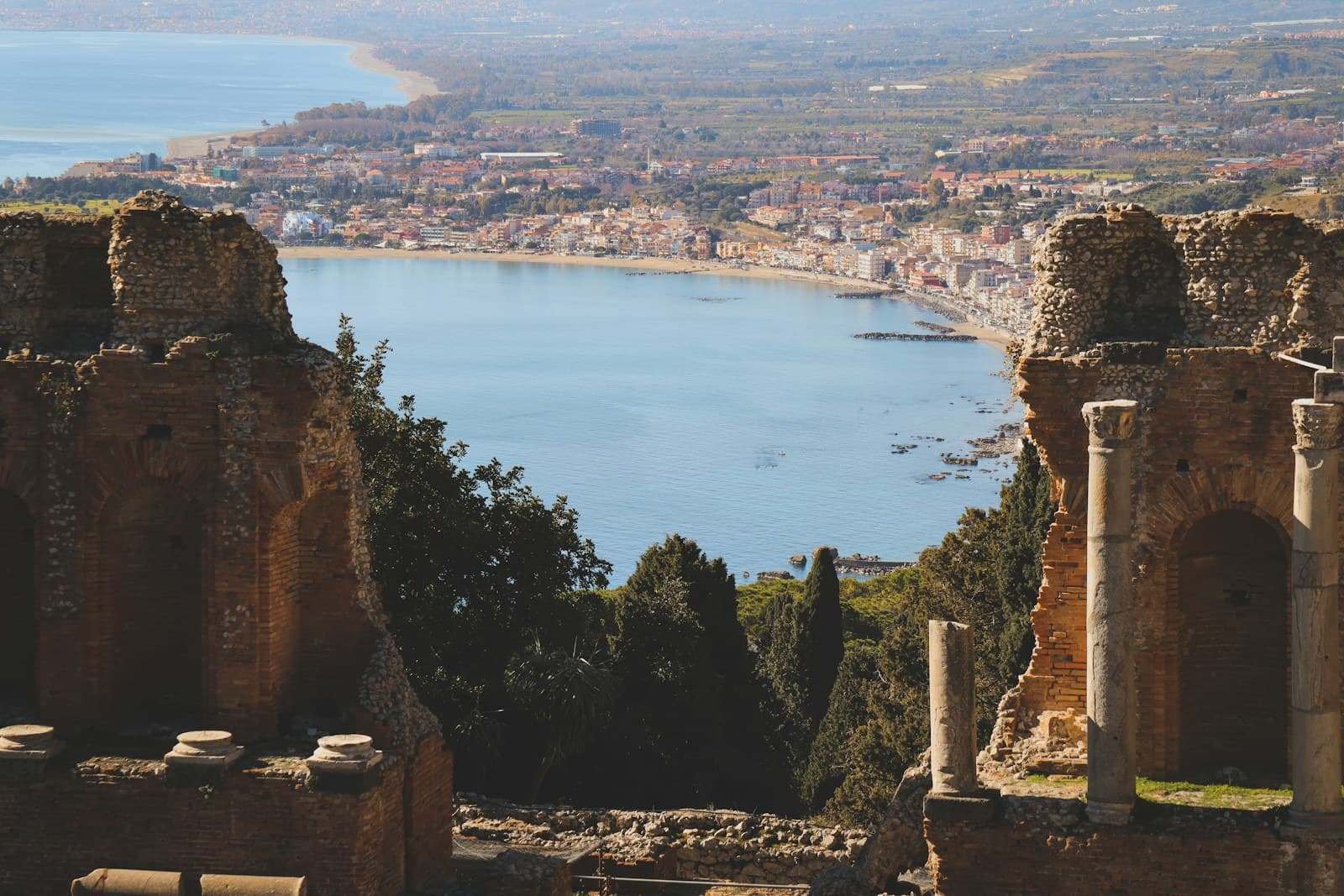 Taormina ancient Greek theatre with Mount Etna in the distance