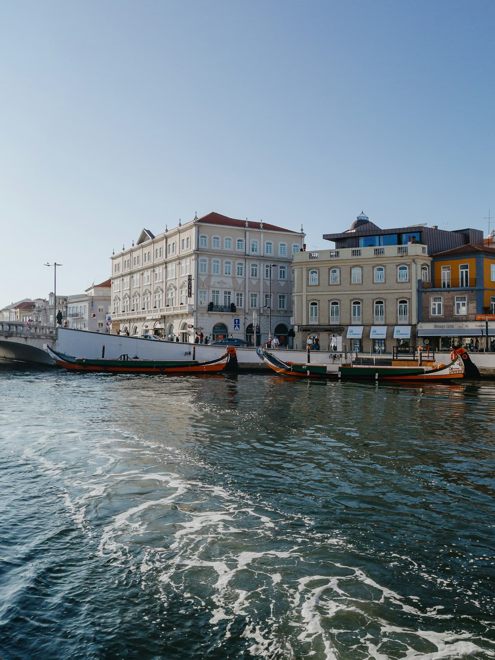 Colorful moliceiro boats on a canal in Aveiro