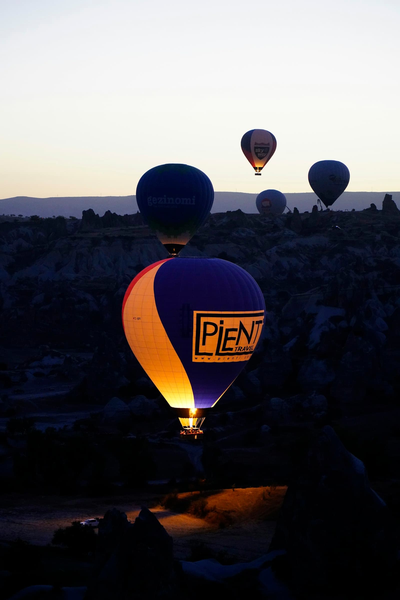 Hot-air balloons over Cappadocia fairy chimneys