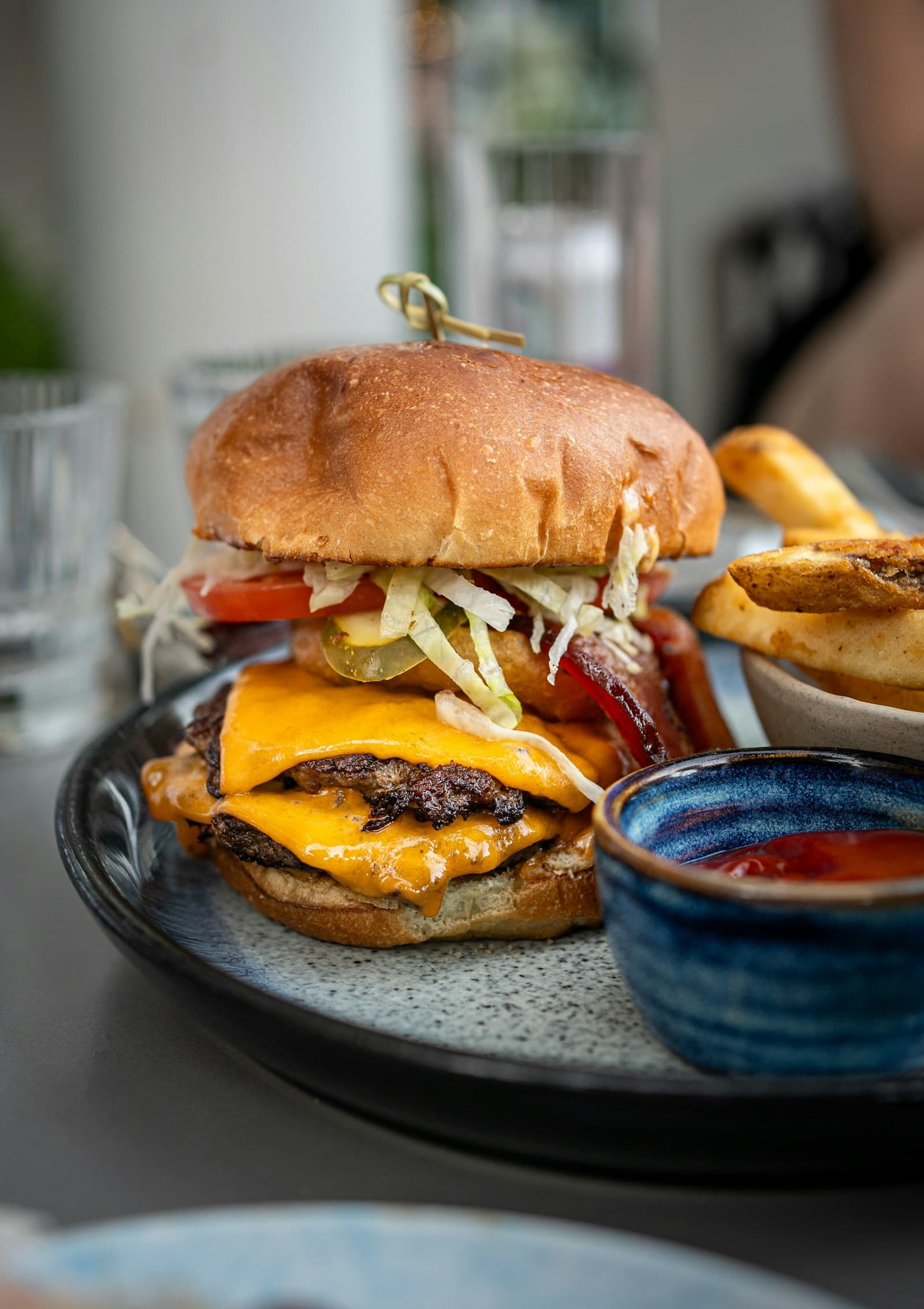Classic American cheeseburger with fries