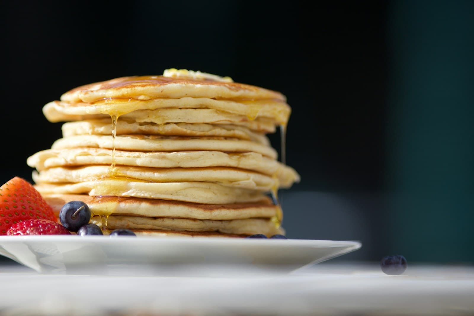 Stack of American pancakes with syrup