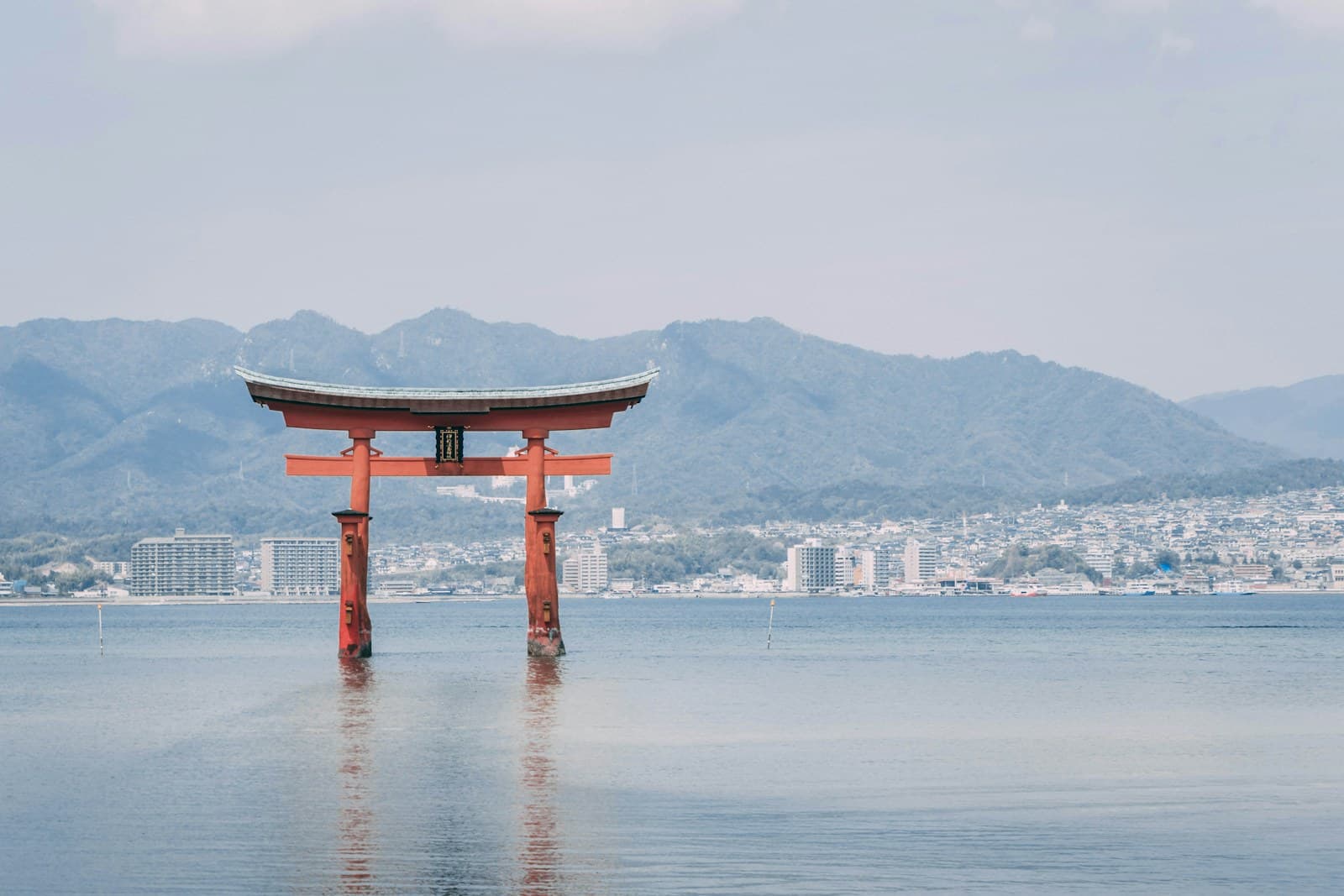 Floating red torii gate of Itsukushima shrine at high tide