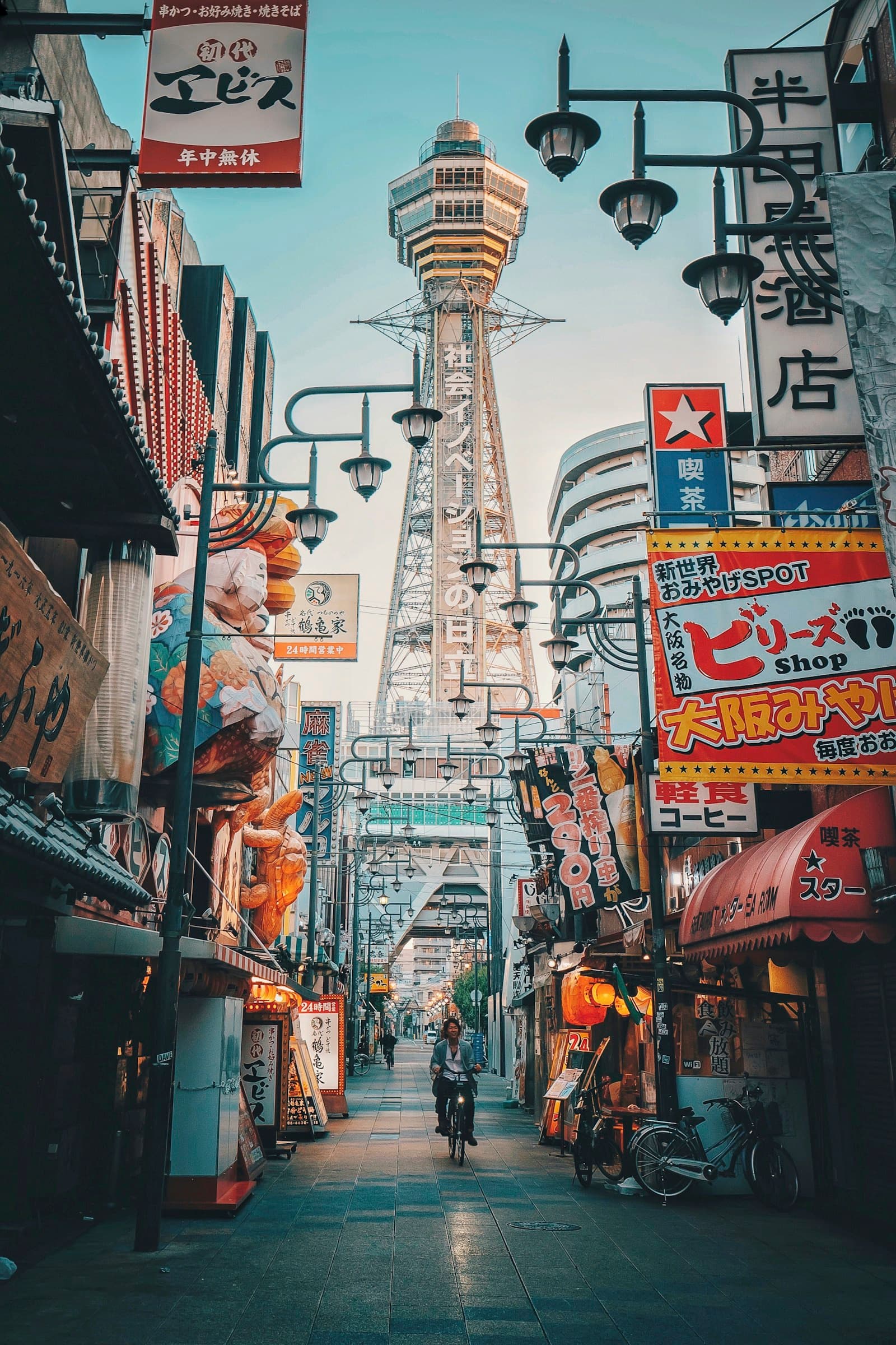 Dotonbori canal at night with neon signs and crowds